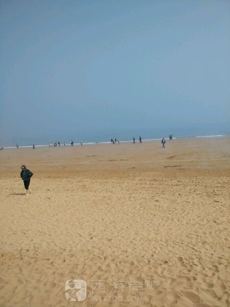 一个人，海浪，沙滩，阳光